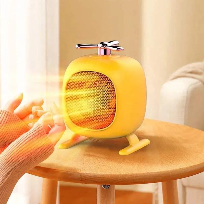 New Mini Home Heater Small Electric Heater Fast Warming Hot air Blower Household Power Saving Desktop Heater